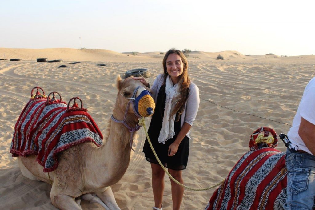 Ruth thanking her friend during the sunrise in the desert in Dubai