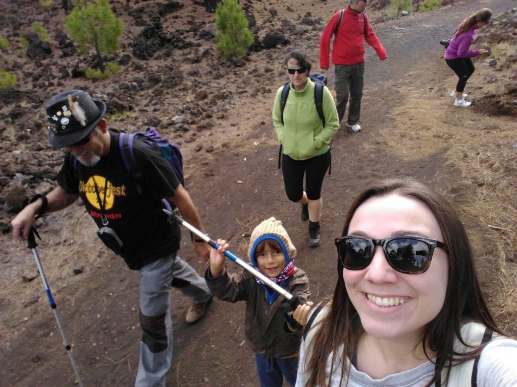 The whole family ready to start the hiking trail of the volcano Chinyero in Tenerife